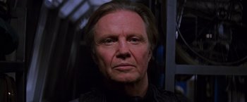 Movie still from “Mission: Impossible” (1996), directed by Brian De Palma – A person with long hair; Close Up shot, Low angle