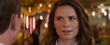 Movie still from “Mission: Impossible - Dead Reckoning Part One” (2023), directed by Christopher McQuarrie – A person with long hair; Close Up shot, Over the shoulder angle