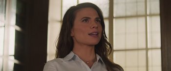 Movie still from “Mission: Impossible - Dead Reckoning Part One” (2023), directed by Christopher McQuarrie – A person wearing a white shirt; Close Up shot, Low angle