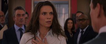 Movie still from “Mission: Impossible - Dead Reckoning Part One” (2023), directed by Christopher McQuarrie – A woman standing next to another woman in front of a wall; Close Up shot, Over the shoulder angle