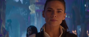 Movie still from “Mission: Impossible - Dead Reckoning Part One” (2023), directed by Christopher McQuarrie – A person wearing a suit and tie; Close Up shot, Over the shoulder angle