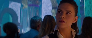 Movie still from “Mission: Impossible - Dead Reckoning Part One” (2023), directed by Christopher McQuarrie – A person wearing a suit and tie; Close Up shot, Over the shoulder angle