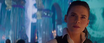 Movie still from “Mission: Impossible - Dead Reckoning Part One” (2023), directed by Christopher McQuarrie – A woman is standing in front of a window; Close Up shot, Over the shoulder angle