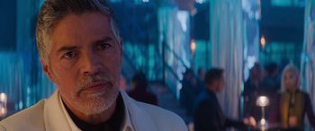 Movie still from “Mission: Impossible - Dead Reckoning Part One” (2023), directed by Christopher McQuarrie – A person wearing a white jacket; Close Up shot, Over the shoulder angle