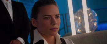 Movie still from “Mission: Impossible - Dead Reckoning Part One” (2023), directed by Christopher McQuarrie – A person wearing a shirt and tie; Close Up shot, Over the shoulder angle