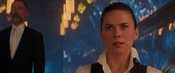 Movie still from “Mission: Impossible - Dead Reckoning Part One” (2023), directed by Christopher McQuarrie – A person wearing a shirt and tie; Close Up shot, Over the shoulder angle