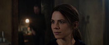 Movie still from “Mission: Impossible - Dead Reckoning Part One” (2023), directed by Christopher McQuarrie – A person looking at the camera; Close Up shot, Over the shoulder angle