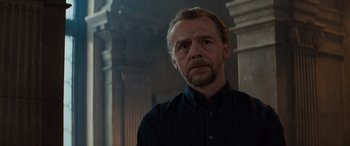 Movie still from “Mission: Impossible - Dead Reckoning Part One” (2023), directed by Christopher McQuarrie – A person wearing a black shirt; Close Up shot, Low angle