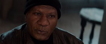 Movie still from “Mission: Impossible - Dead Reckoning Part One” (2023), directed by Christopher McQuarrie – A person wearing a hat; Close Up shot, Low angle