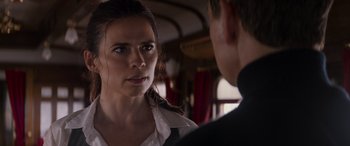 Movie still from “Mission: Impossible - Dead Reckoning Part One” (2023), directed by Christopher McQuarrie – A man and a woman are standing next to each other; Close Up shot, Over the shoulder angle