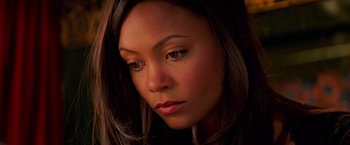 Movie still from “Mission: Impossible II” (2000), directed by John Woo – A person with long hair; Close Up shot, High angle