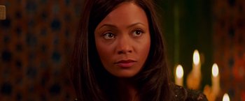 Movie still from “Mission: Impossible II” (2000), directed by John Woo – A person with brown eyes; Close Up shot, High angle