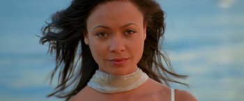 Movie still from “Mission: Impossible II” (2000), directed by John Woo – A person with long hair; Close Up shot, Low angle