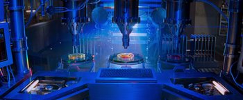 Movie still from “Mission: Impossible II” (2000), directed by John Woo – A computer is shown in front of a computer screen; Extreme Close Up shot, Overhead angle