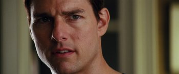 Movie still from “Mission: Impossible III” (2006), directed by J.J. Abrams – A man's face as he stares at the camera; Close Up shot, Low angle