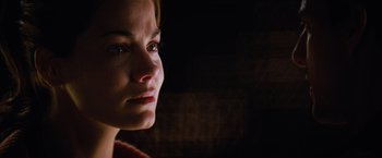 Movie still from “Mission: Impossible III” (2006), directed by J.J. Abrams – A person looking at the camera; Close Up shot, Over the shoulder angle