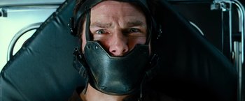 Movie still from “Mission: Impossible III” (2006), directed by J.J. Abrams – A person wearing a helmet; Close Up shot, Low angle