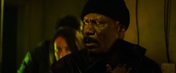 Movie still from “Mission: Impossible III” (2006), directed by J.J. Abrams – A person wearing a hat; Close Up shot, Over the shoulder angle