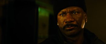 Movie still from “Mission: Impossible III” (2006), directed by J.J. Abrams – A person wearing a hat; Close Up shot, Low angle