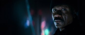 Movie still from “Mission: Impossible III” (2006), directed by J.J. Abrams – A person with a mustache; Close Up shot, Low angle