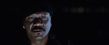 Movie still from “Mission: Impossible III” (2006), directed by J.J. Abrams – A person wearing a hat; Close Up shot, Low angle