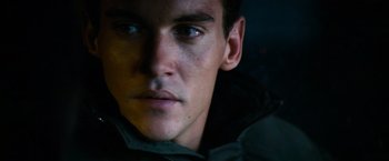 Movie still from “Mission: Impossible III” (2006), directed by J.J. Abrams – A man's face in the dark; Close Up shot, High angle