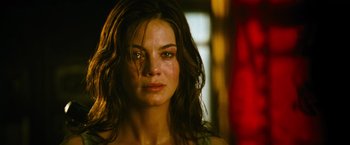 Movie still from “Mission: Impossible III” (2006), directed by J.J. Abrams – A person with wet hair; Close Up shot, Over the shoulder angle