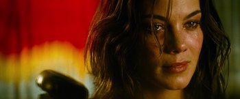 Movie still from “Mission: Impossible III” (2006), directed by J.J. Abrams – A woman's eyes and hair; Close Up shot, Over the shoulder angle