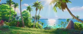 Movie still from “Moana” (2016), directed by Chris Williams – A view of the ocean from a hill with palm trees in the foreground; Extreme Wide shot, High angle