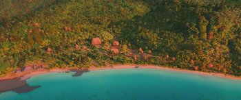 Movie still from “Moana” (2016), directed by Chris Williams – An aerial view of a beach and a forest; Extreme Wide shot, High angle