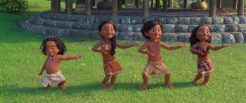 Movie still from “Moana” (2016), directed by Chris Williams – A couple of people standing on top of a grass covered field; Wide shot, High angle