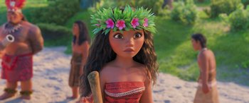 Movie still from “Moana” (2016), directed by Chris Williams – A young girl with a flower crown on her head; Close Up shot, Over the shoulder angle