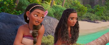 Movie still from “Moana” (2016), directed by Chris Williams – A couple of women standing next to each other on top of a hill; Close Up shot, Over the shoulder angle