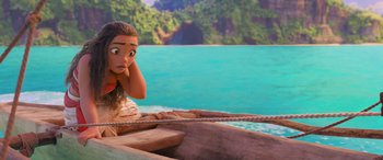 Movie still from “Moana” (2016), directed by Chris Williams – A young girl is sitting in a boat in front of the ocean; Wide shot, High angle