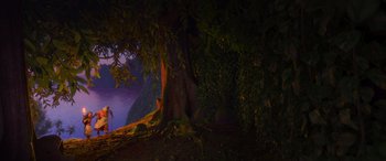 Movie still from “Moana” (2016), directed by Chris Williams – A large tree in the middle of a forest; Extreme Wide shot, Over the shoulder angle
