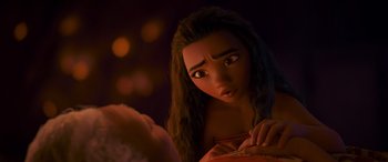 Movie still from “Moana” (2016), directed by Chris Williams – A young woman is looking at the camera; Close Up shot, Over the shoulder angle