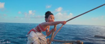 Movie still from “Moana” (2016), directed by Chris Williams – A young girl holding onto a rope on a boat; Wide shot, Low angle