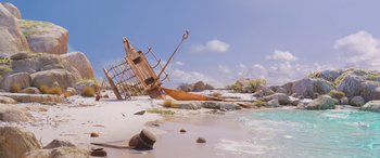Movie still from “Moana” (2016), directed by Chris Williams – An old wooden boat on the shore of a beach; Extreme Wide shot, High angle