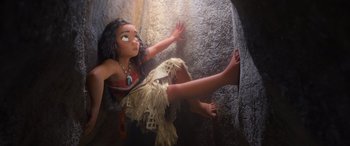 Movie still from “Moana” (2016), directed by Chris Williams – A doll of a young girl dressed as moana; Wide shot, Overhead angle