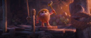 Movie still from “Moana” (2016), directed by Chris Williams – A stuffed animal holding a wooden stick in its mouth; Wide shot, Low angle