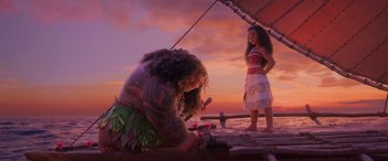 Movie still from “Moana” (2016), directed by Chris Williams – Two people standing on a boat in the ocean at sunset; Wide shot, Low angle