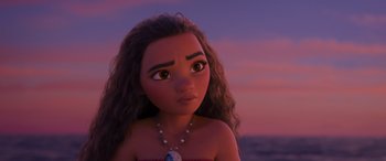 Movie still from “Moana” (2016), directed by Chris Williams – A person with long hair and a necklace; Close Up shot, Low angle