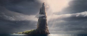 Movie still from “Moana” (2016), directed by Chris Williams – An image of an island with a tower in the middle of it; Extreme Wide shot, Low angle