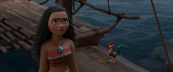 Movie still from “Moana” (2016), directed by Chris Williams – A woman standing on a boat next to a rooster; Medium shot, Over the shoulder angle