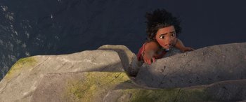 Movie still from “Moana” (2016), directed by Chris Williams – A young girl is climbing a rock wall; Medium shot, Overhead angle
