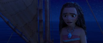 Movie still from “Moana” (2016), directed by Chris Williams – A young girl is looking at the camera in front of a boat; Close Up shot, Over the shoulder angle