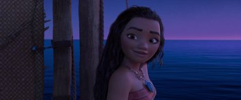 Movie still from “Moana” (2016), directed by Chris Williams – A person with long black hair; Close Up shot, Over the shoulder angle