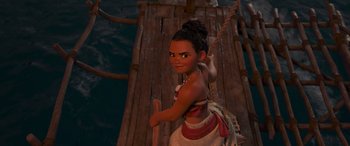 Movie still from “Moana” (2016), directed by Chris Williams – A young woman is standing on a pier; Medium shot, Over the shoulder angle