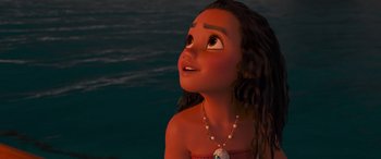 Movie still from “Moana” (2016), directed by Chris Williams – A young girl looking up at the sky; Close Up shot, Low angle