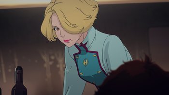 Movie still from “Mobile Suit Gundam: Hathaway” (2021), directed by Shûkô Murase – A woman with blonde hair wearing a blue shirt; Close Up shot, Over the shoulder angle